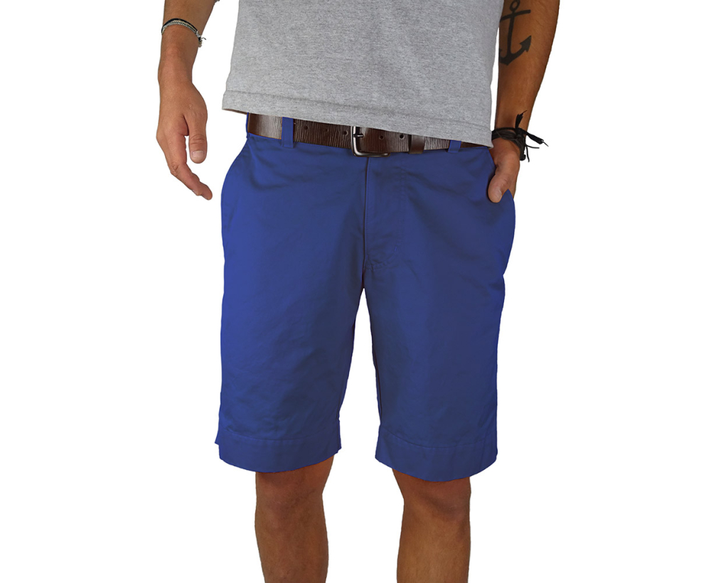 Man standing wearing navy twill shorts - front view